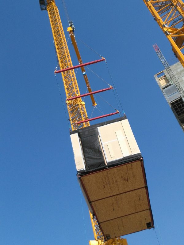 20 Tonne Lifting System Comprising Of A 12m Long Multi-point Lifting Beam With 5 No. 3 To 5m Span Telescopic Beams Under Specially Designed To Lift Differing Sizes And Shapes Of Modular Building. This System In Conjunction With An Automatic Weighing System Was Used To Assemble A 24 Story Building, Each Floor With 49 Different Modules In Record Time.