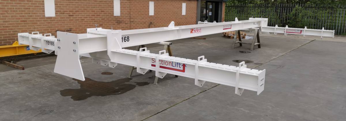 15.5 Tonne Adjustable H Frame Style Lifting Beam. This Was Deigned For Hinckley Point Nuclear Power Station To Lift Different Sizes Of Rebar Mat. It Has A Span Of 9m And A Width Of 6m And Is Fully Adjustable In Both Length And Width. This Beam Was So Successful As Both Time And Labour Were Saved During The Operations A Further 2 Were Ordered And Subsequently Supplied.